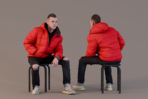 Guy In Red Puffer Jacket And Jeans