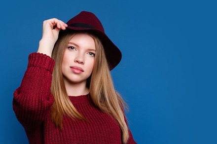 Young woman smiling in studio, a Person Photo by Elena Vagengeim