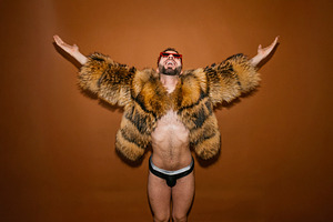 Man in fur coat celebrating self-expression
