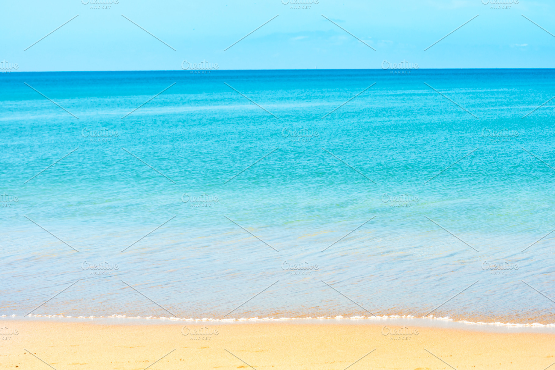 Blue sea water and sand beach, a Nature Photo by Vapi