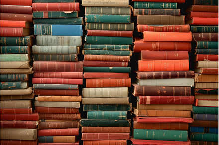 Antique book collection on shelves, an Arts & Entertainment Photo by Ylivdesign