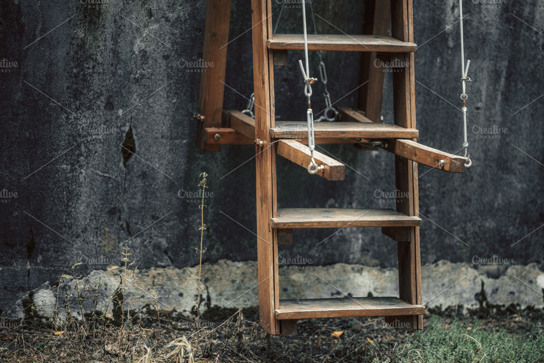 Hanging wooden ladder in yard, an Architecture Photo by SkyNext