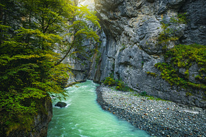 Winding river bed in the Aare gorge, a Nature Photo by Alpine Dreams