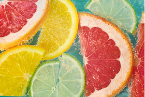 Bright slices of grapefruit, lime, a Food & Drink Photo by darksoul72