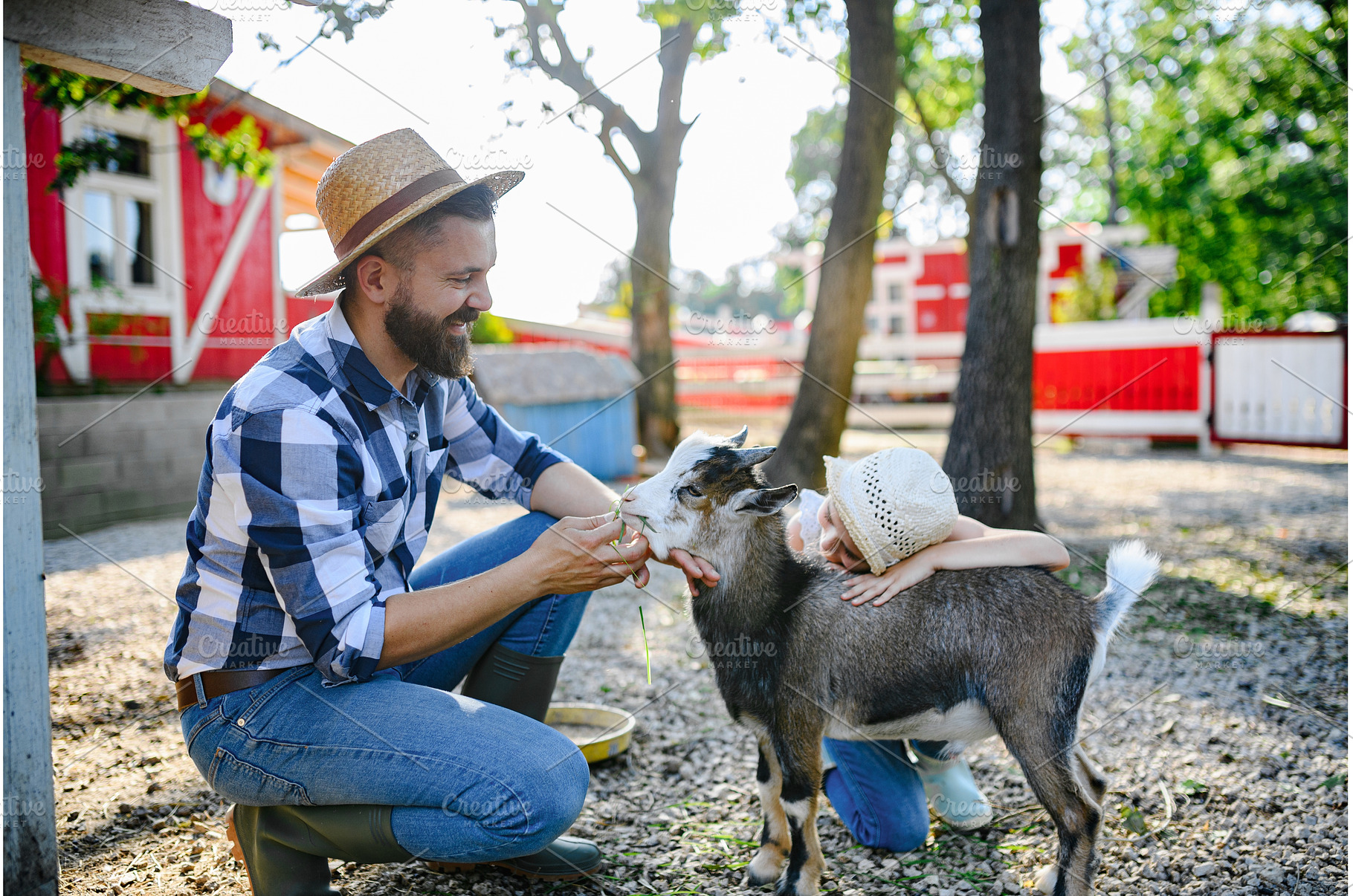Portrait of farmer petting goat at, a Person Photo by HalfPoint