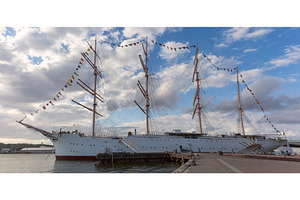 Tall ship and waterfront skyline in, a Transportation Photo by kavalenkava