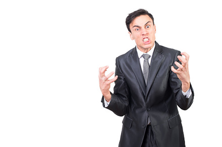 Hysterical man in formal suit in studio, a Business Photo by Iván Moreno STOCK PHOTO