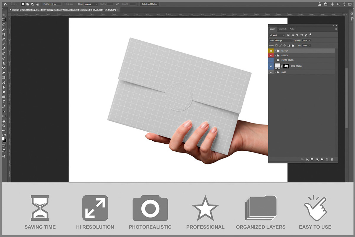 Woman's Hand Holding Wrapping Pa PSD, a Merchandise Mockup by Bruno's Shop (Photo 2 of 3)