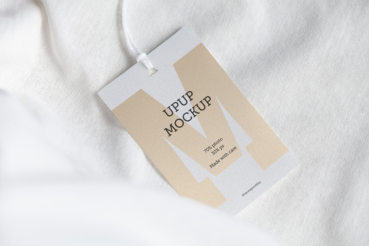 Clothes label tag blank white mockup, an Advertising Mockup by Olha Klein (Photo 1 of 3)