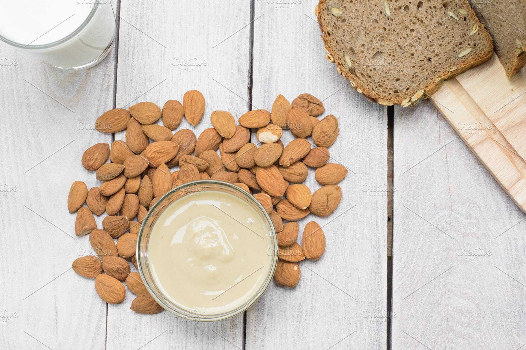 Almond butter, a Background Photo by jarafoti