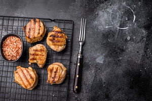 BBQ grilled pork medallions steaks, tenderloin fillet meat. blac, a Food & Drink Photo by composter-box@mail.ru