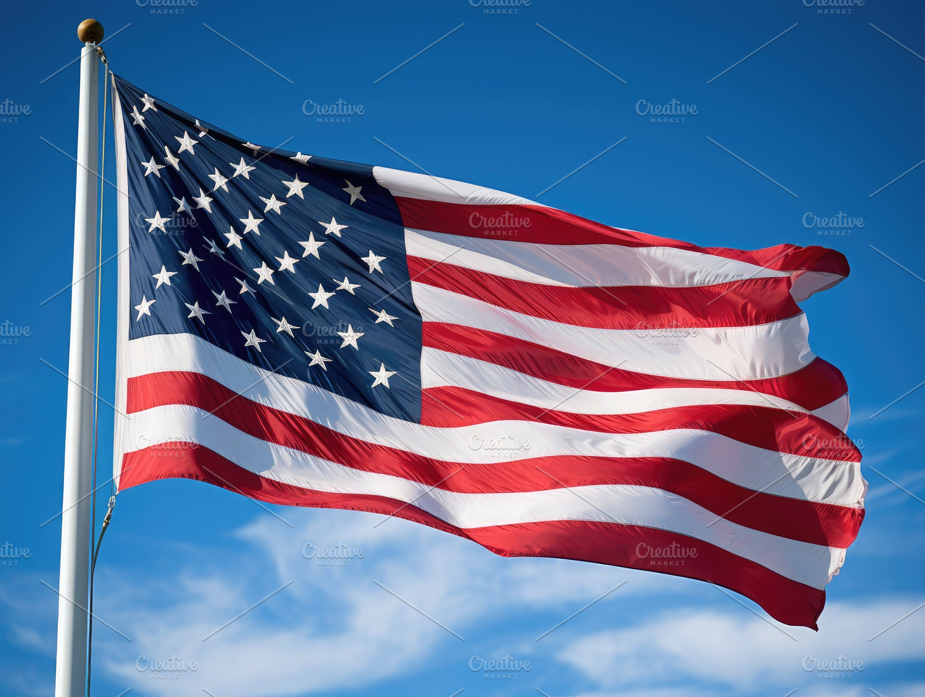 American flag waving proudly in the, a Photo by SaroStock