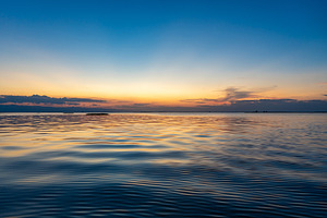 Sunset over Lake Tempe in Sulawesi, Indonesia, a Nature Photo by GoodGoods