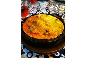 Iakhni served on ketsi, closeup, a Food & Drink Photo by sceptical cactus
