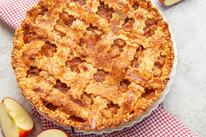 Delicious homemade apple pie decorated with fresh apple slices a, a Food & Drink Photo by Olena Rudo