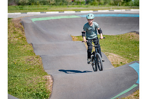 Pump track. Child on bmx bike rides, a Sports & Recreation Photo by Fascinadora