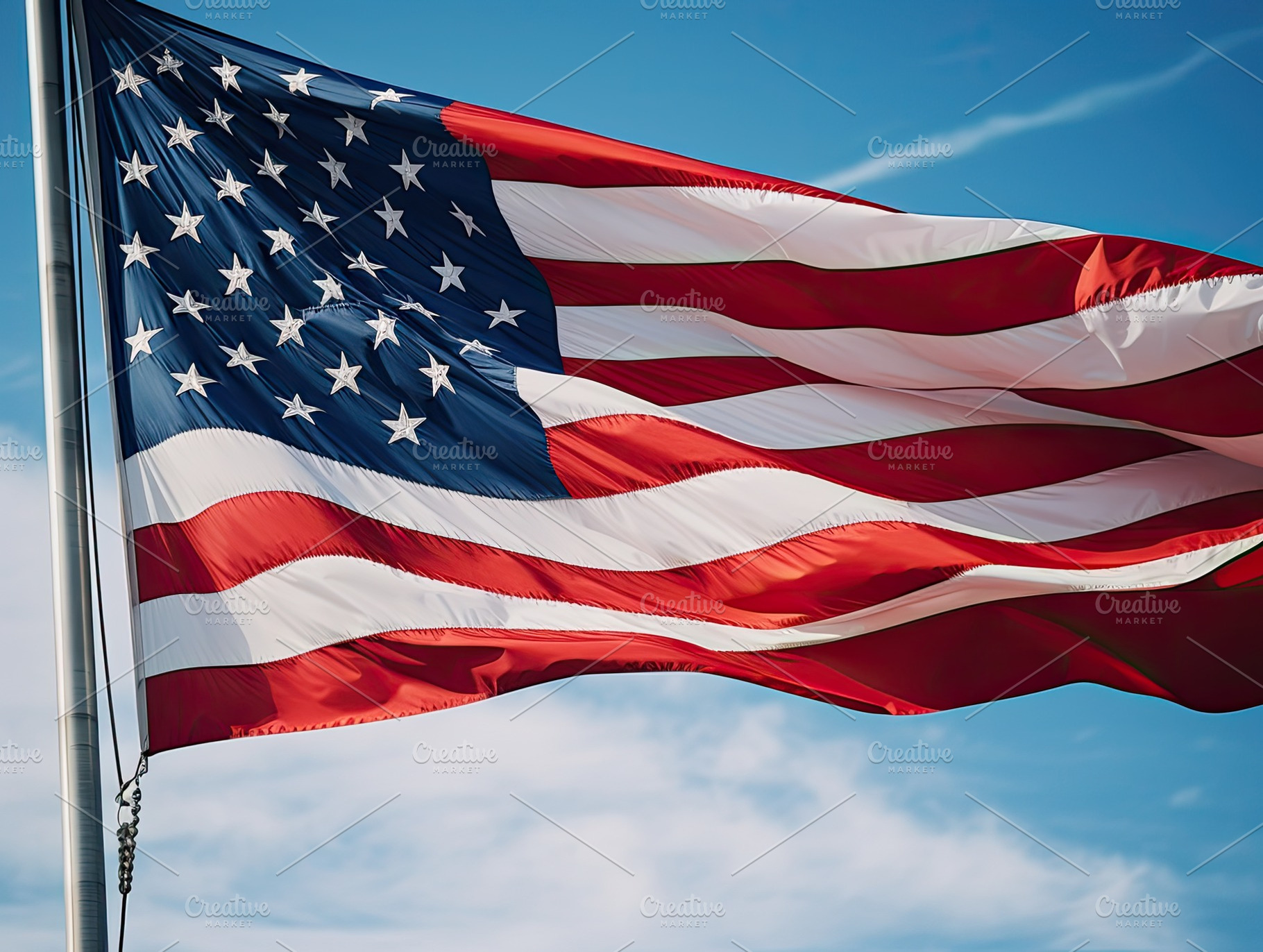 American flag waving proudly in the, a Photo by SaroStock
