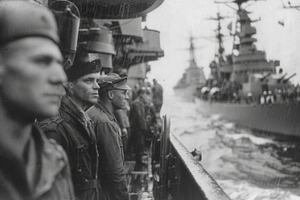Sailors observing naval activity during wartime on a rainy day, a Photo by AS photostudio