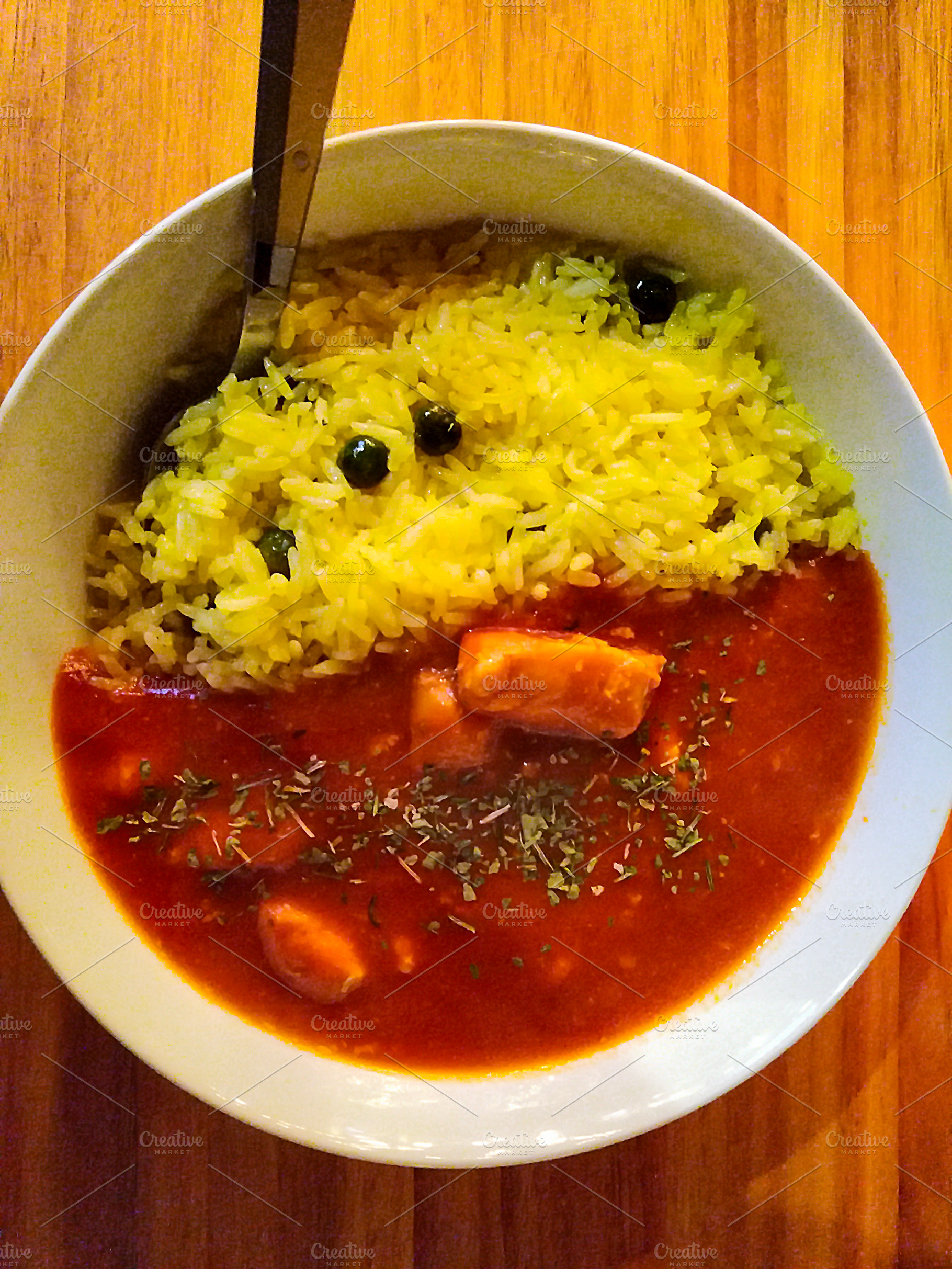 Rustic codfish with rice and olives in tomato sauce, a Food & Drink Photo by DanFLCreativo