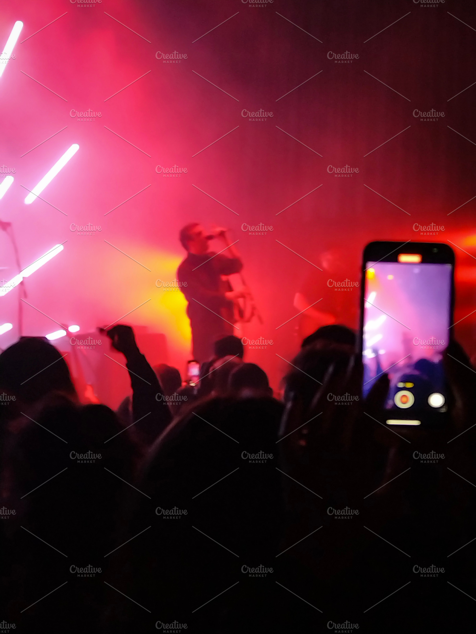 Live band on stage with radial light beams, a Sports & Recreation Photo by DanFLCreativo