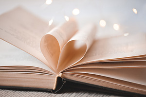 Open book closeup stock photo containing adorable and nobody, a School & Education Photo by morrowlight