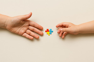 Autism Awareness Day puzzle concept, a Photo by Dvoevnore photos