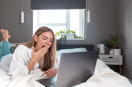 Girl yawn, tired of remote work, a Person Photo by Lenor4ik