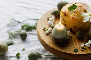 Happy Easter! Stylish dyed eggs, easter cake on wooden stand, sp, a Holiday Photo by Sonjachni