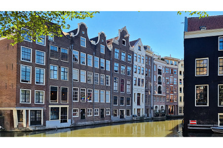 Channel in Amsterdam Netherlands, an Architecture Photo by Beautiful things