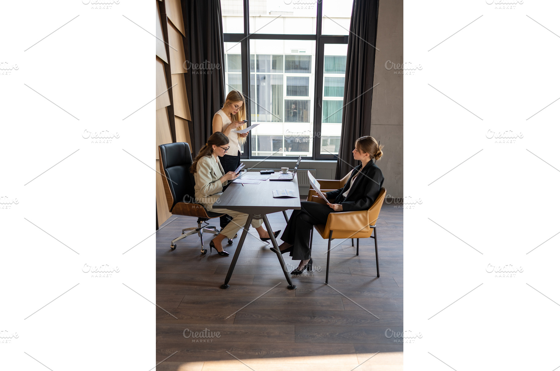 Female executives conducting work, a Business Photo by undrey