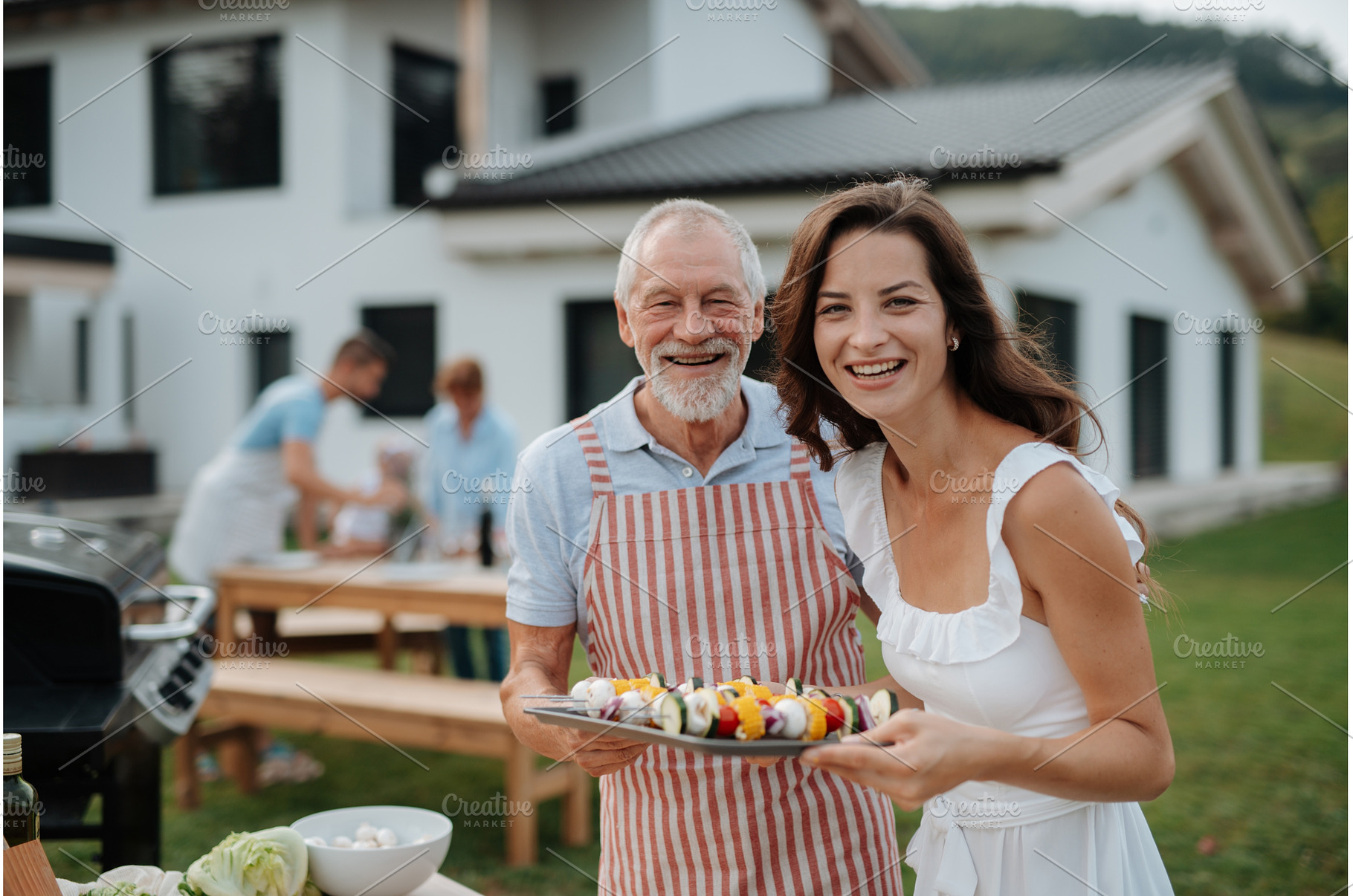 Older father and adult daughter, a Person Photo by HalfPoint