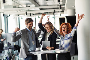 Business colleagues celebrating, a Business Photo by HalfPoint
