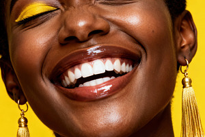 Radiant Joy: Beautiful Black Woman, a Person Photo by Virgo Studio