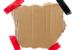 Torn piece of brown corrugated cardboard attached to red piece o, a Background Photo by ndanko
