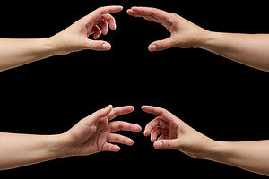 Women's hands reaching towards each other, expressive gestures, a Person Photo by ndanko