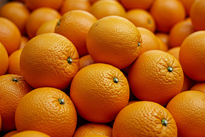 Fresh ripe oranges piled together sh, a Food & Drink Photo by professorinc