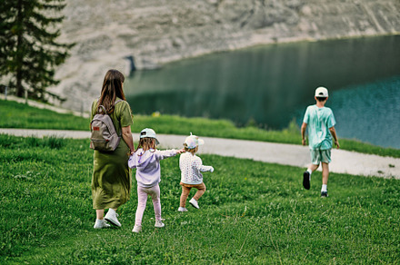 Mother with kids at Vorderer Gosausee, Gosau, Upper Austria., a Background Photo by AS photostudio