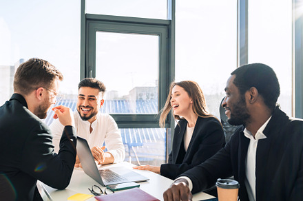 Cheerful employees of a financial, a Photo by borodai94