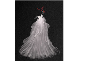 White wedding dress on hanger