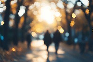 Background of blurred city park with walking people, a Background Photo by AlyaAnd