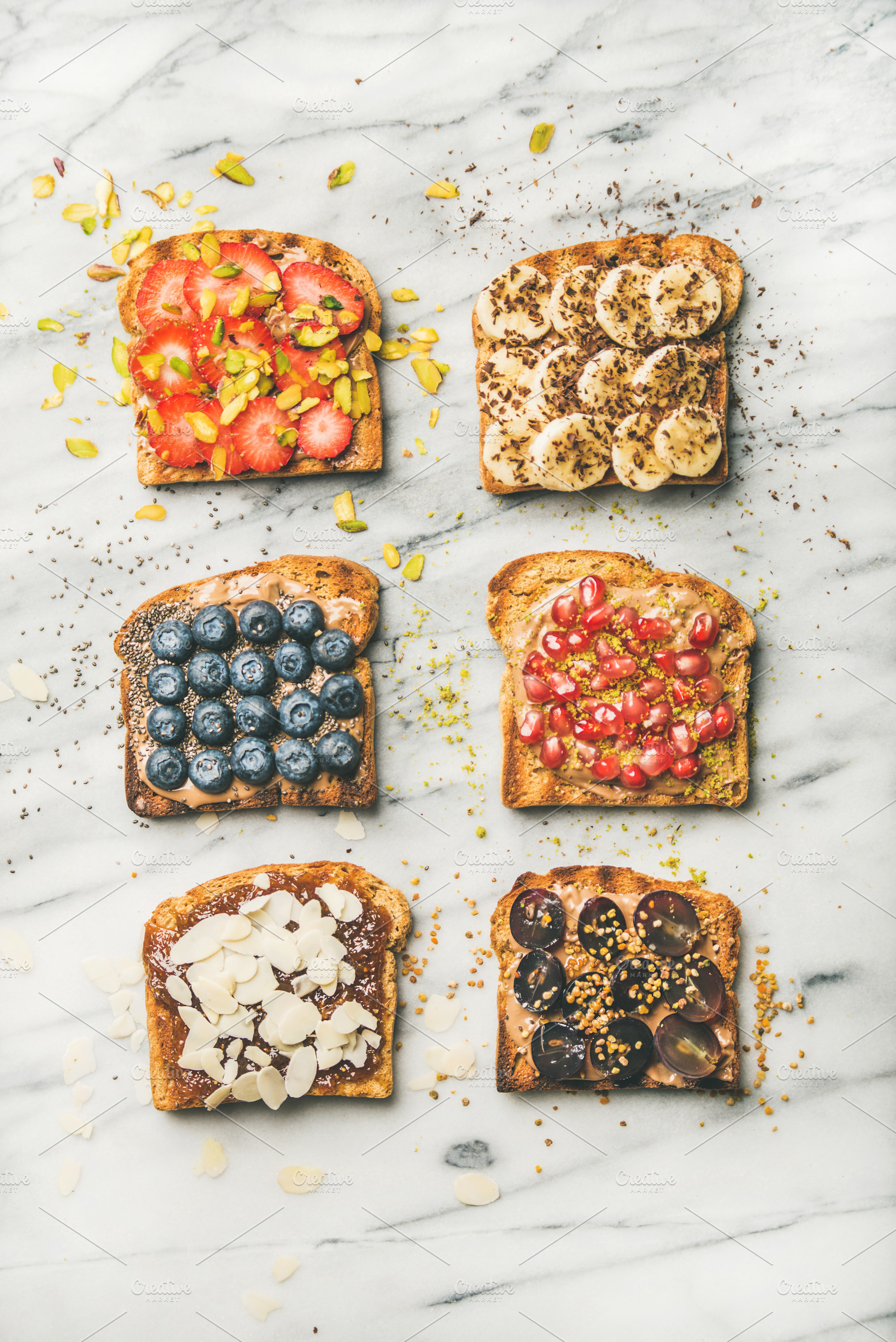 Vegan toasts with fruit, seeds, nuts, a Food & Drink Photo by Foxys