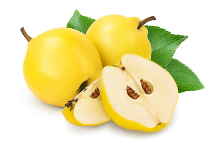 Fresh quince with half isolated on, a Food & Drink Photo by NataPhoto