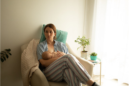 Mothed and baby, breastfeeding in, a Person Photo by oksix