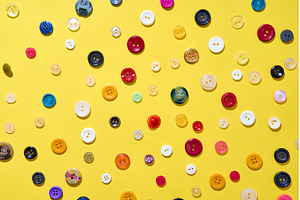 Colorful sewing buttons on bright
