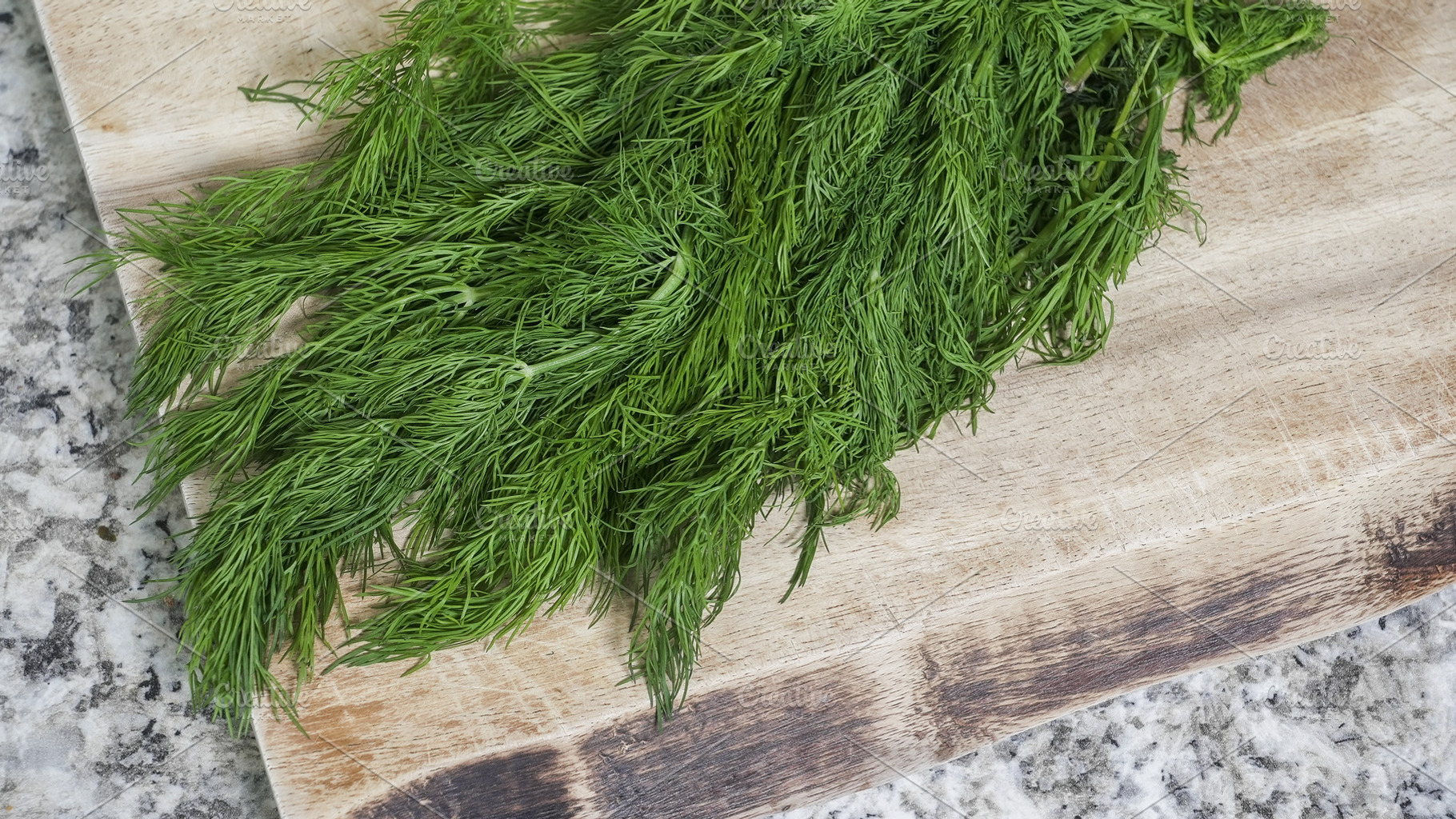 Fresh green dill herb bunch on woode, a Food & Drink Photo by 1miromiro