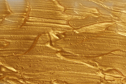 Sample of golden glitter gel with small particles, texture of hi, an Abstract Photo by ndanko