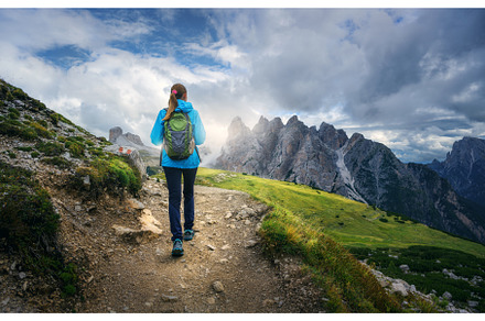 Female hiker walking on mountain