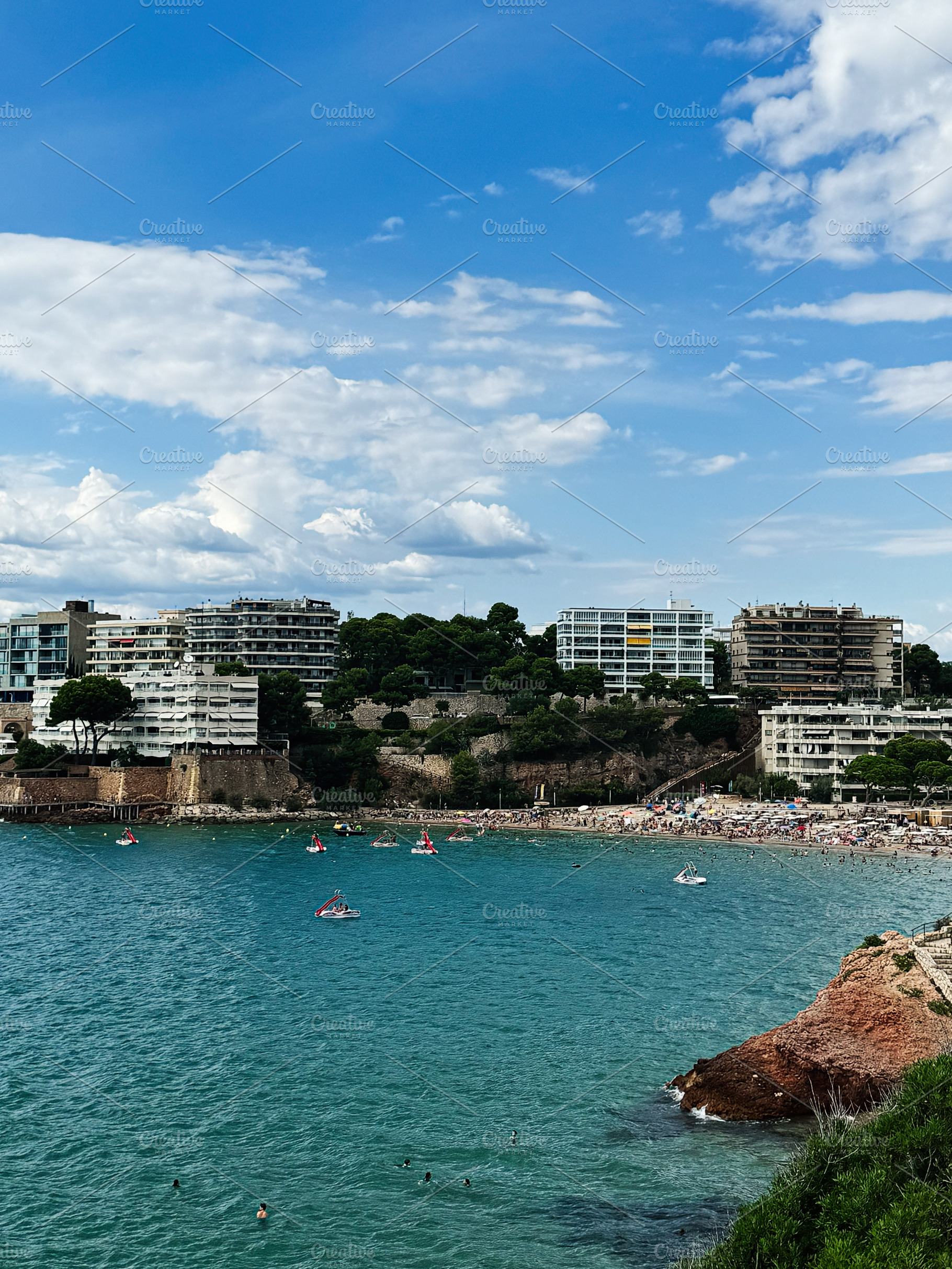 Picturesque Coastline with Beach and Modern Buildings in Tarragona, Spain, a Photo by AS photostudio