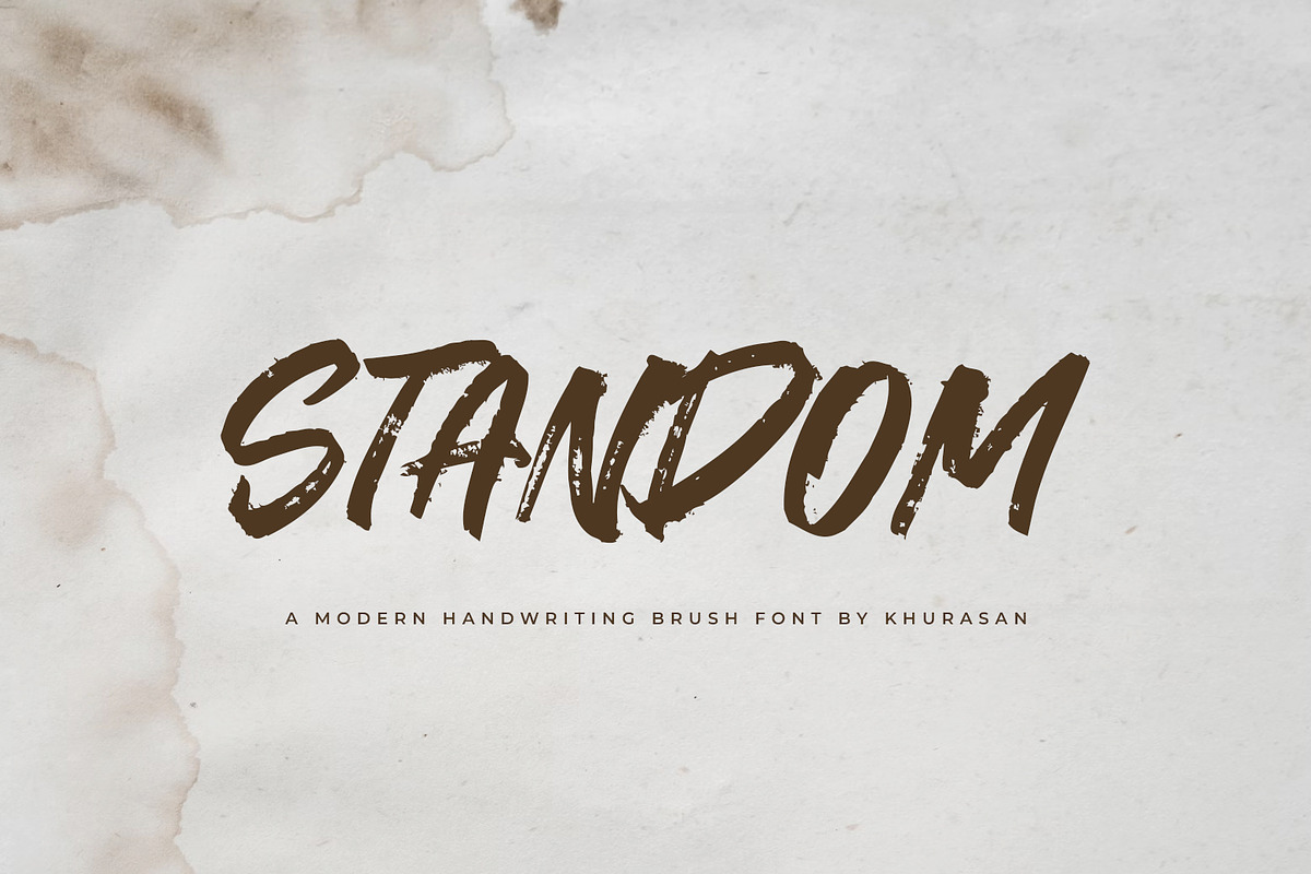 Standom Brush Font, a Handwritten Font by khurasan (Photo 1 of 4)