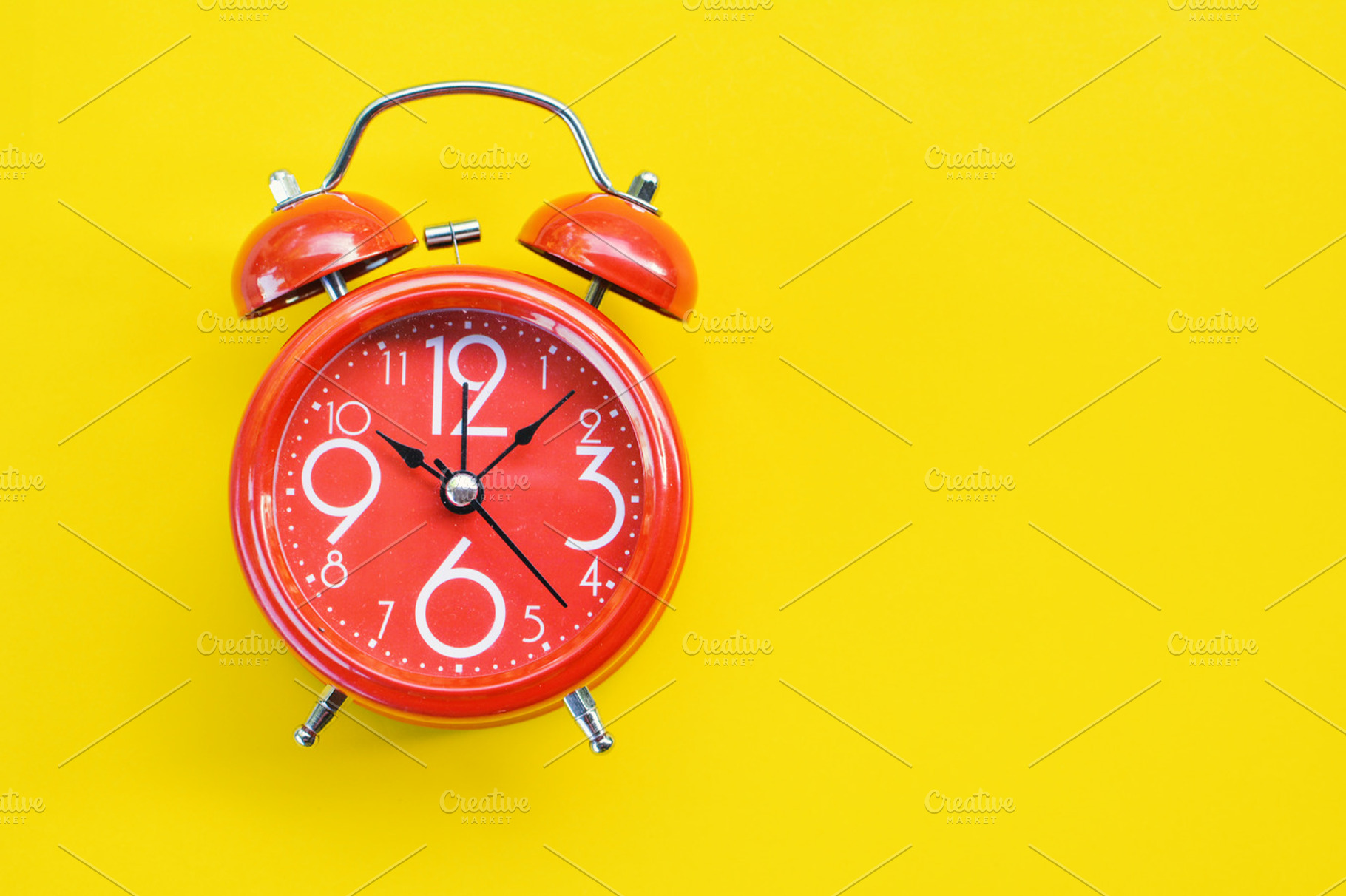 Red alarm clock featuring clock, color, and noon, a Beauty & Fashion Photo by sawitree